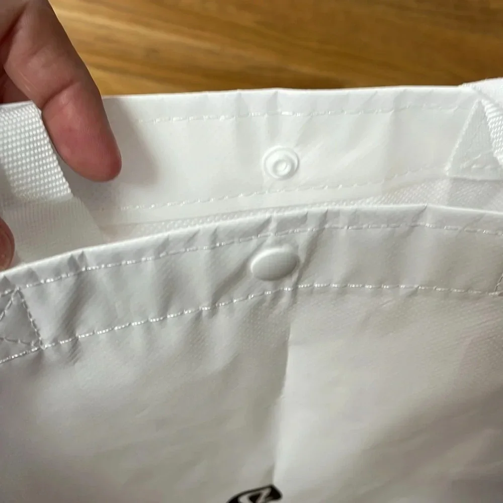 Lululemon reusable tote Snap closure. Black and white. 16” long x 14” wide x 6”
